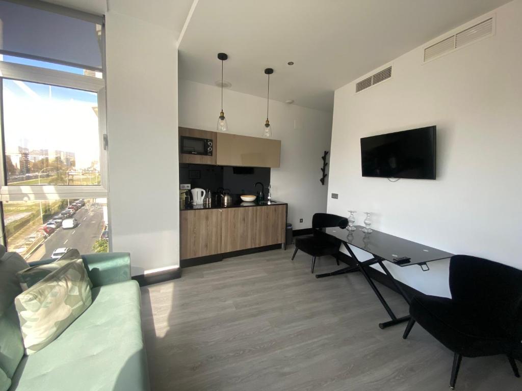 Kuchyňa alebo kuchynka v ubytovaní Stay U-nique Apartments Rosaleda