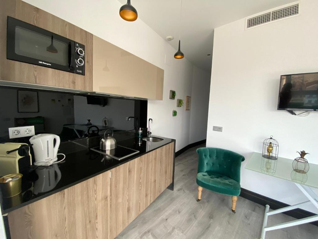 Kuchyňa alebo kuchynka v ubytovaní Stay U-nique Apartments Rosaleda