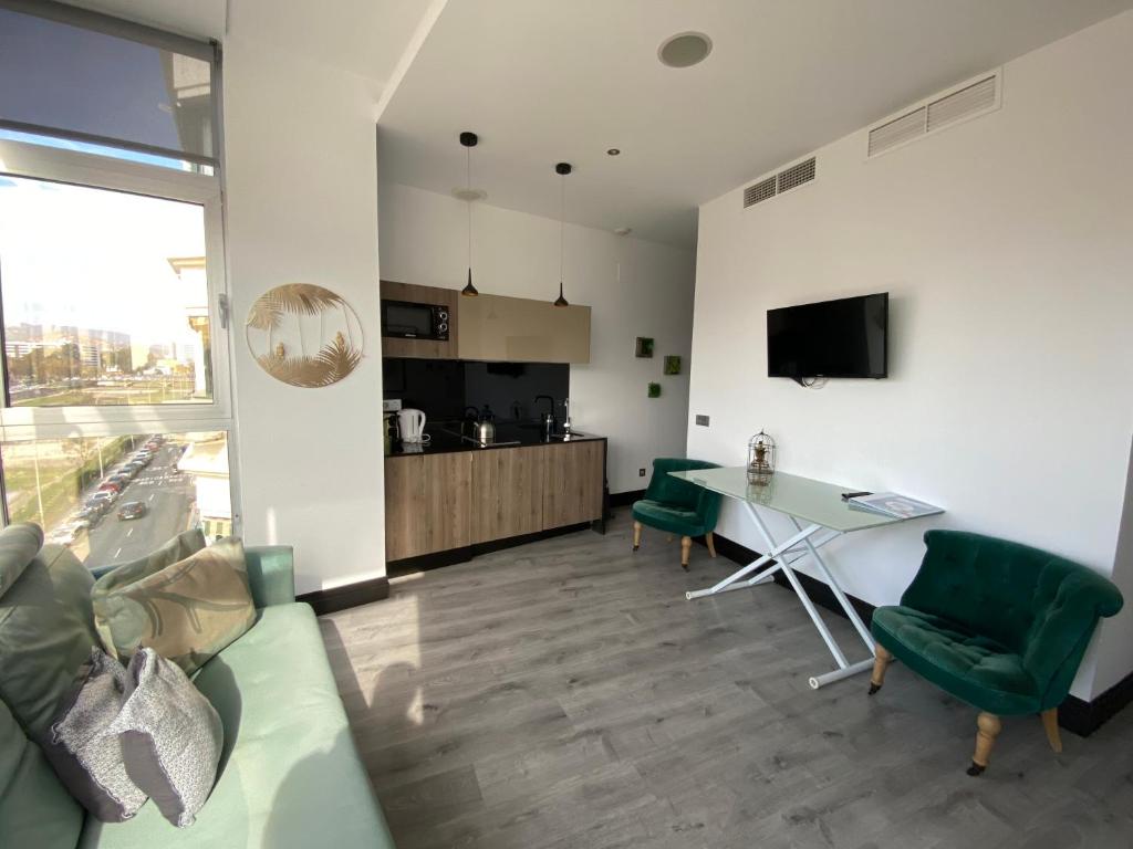Kuchyňa alebo kuchynka v ubytovaní Stay U-nique Apartments Rosaleda