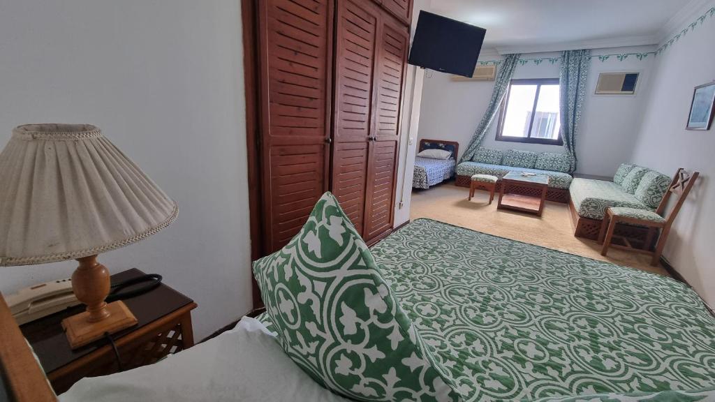 Postel nebo postele na pokoji v ubytování Hotel Zelis