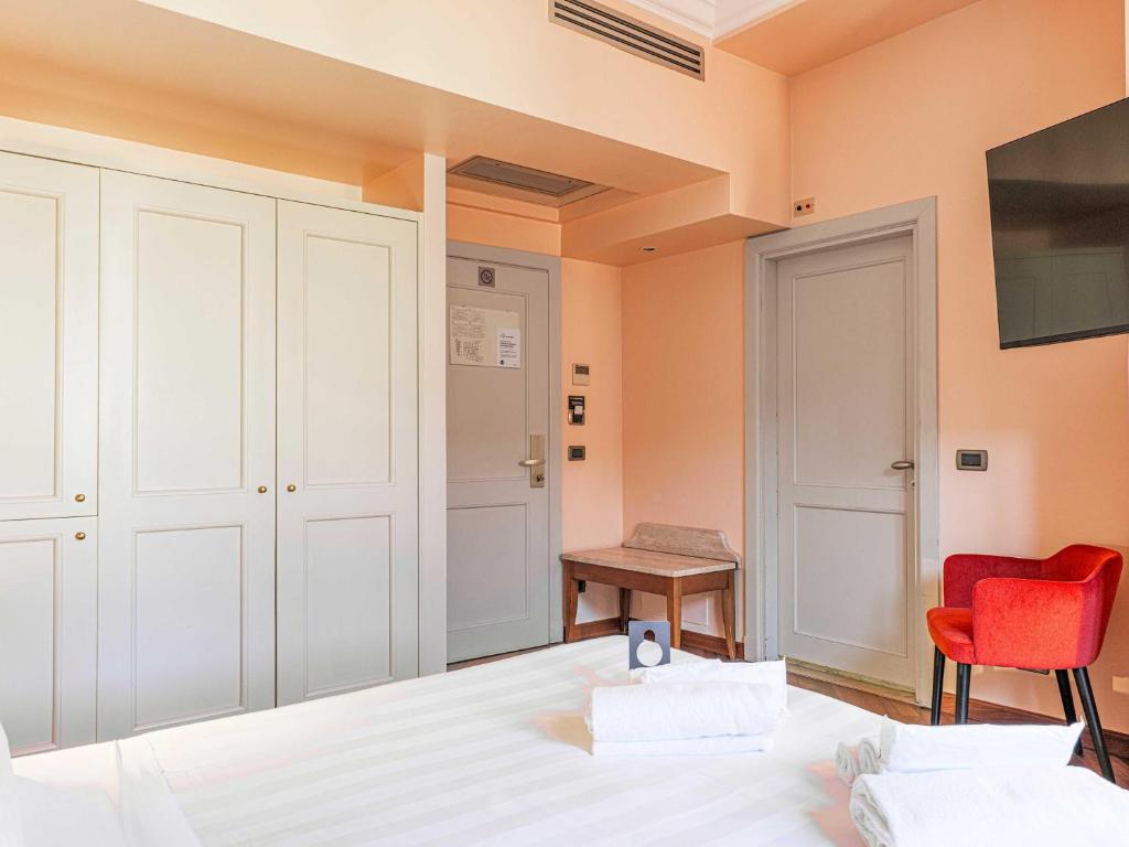 Postel nebo postele na pokoji v ubytování B&B Hotel Firenze Laurus Al Duomo