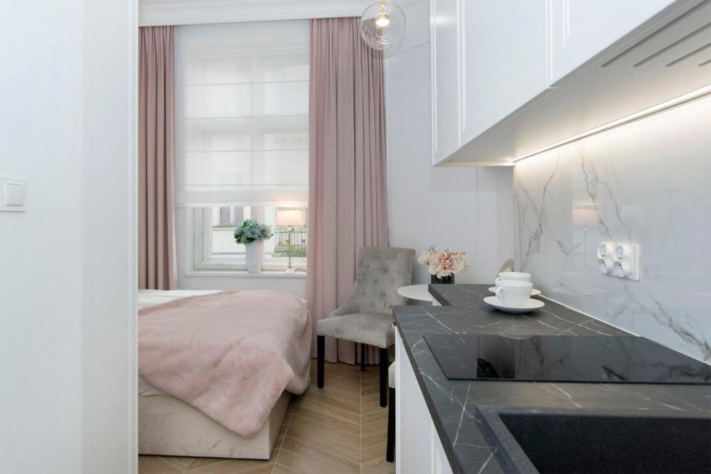 Posteľ alebo postele v izbe v ubytovaní La Boutique Studio Sopot