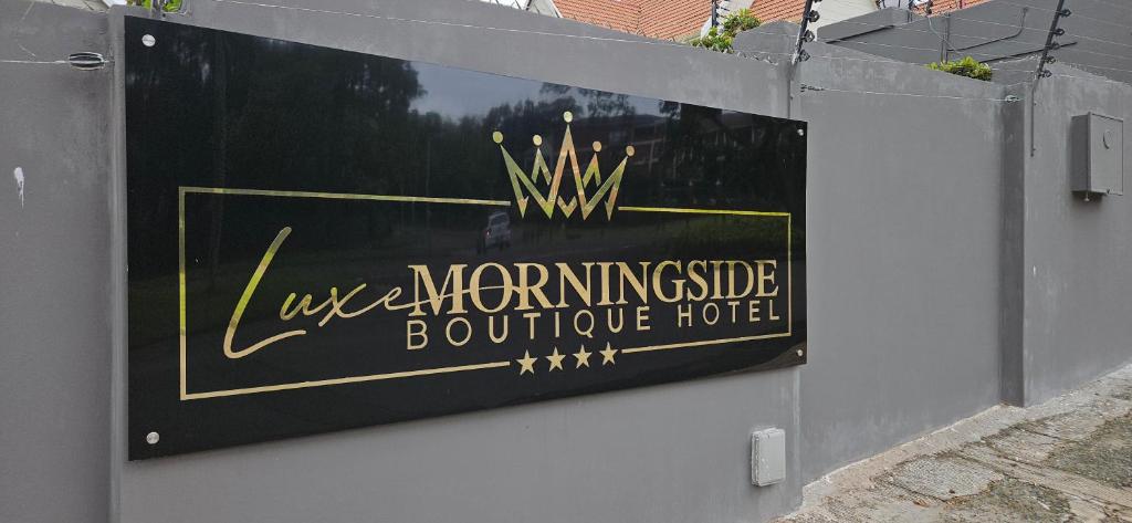 Un certificat, premiu, logo sau alt document afișat la Luxe Morningside Boutique Hotel