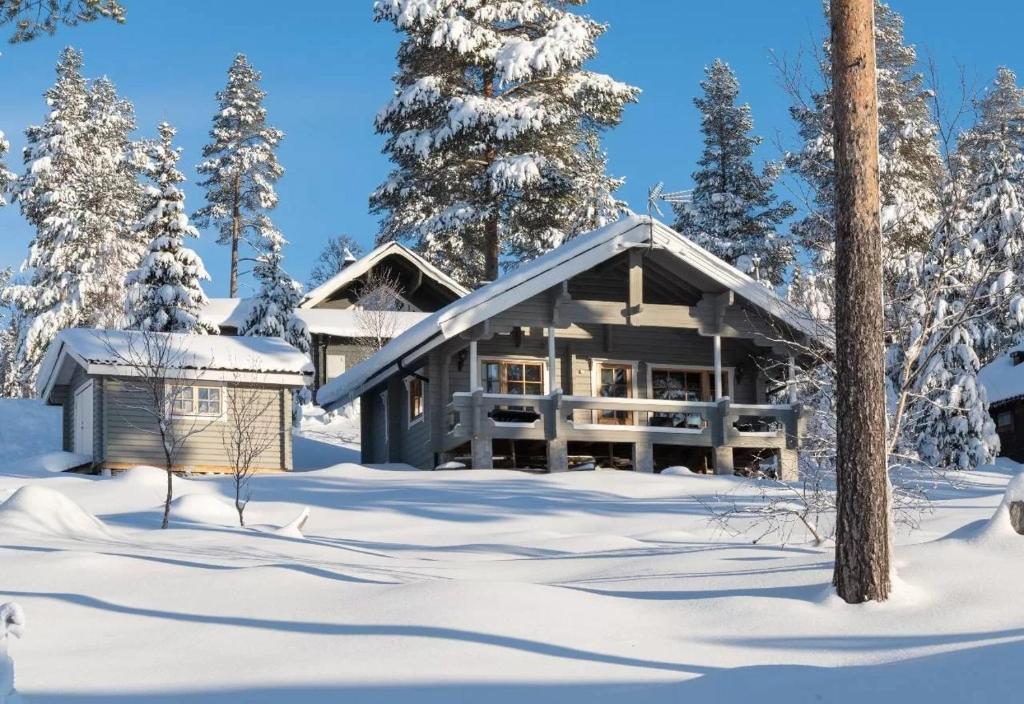 a log cabin in the snow with trees at Ski-in/Ski-out | Sauna | Pets allowed | Terrace in Lofsdalen