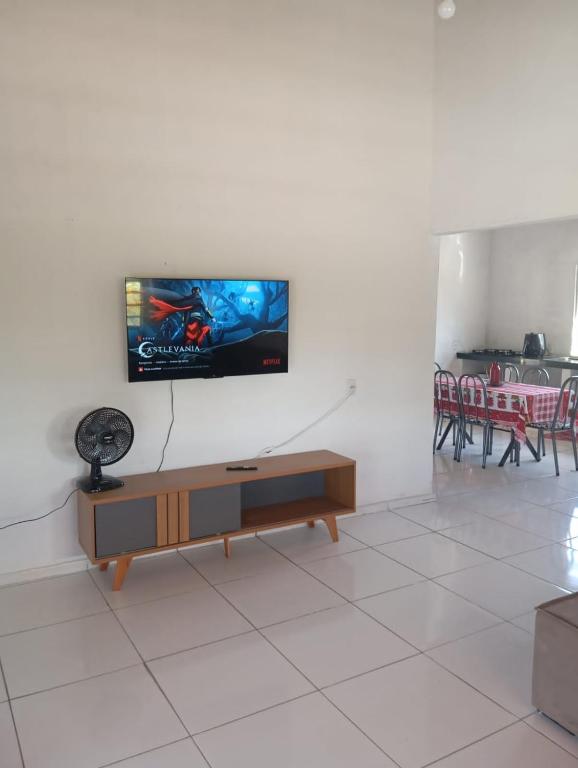 TV a/nebo společenská místnost v ubytování Paraíso do Sossego Pirenópolis