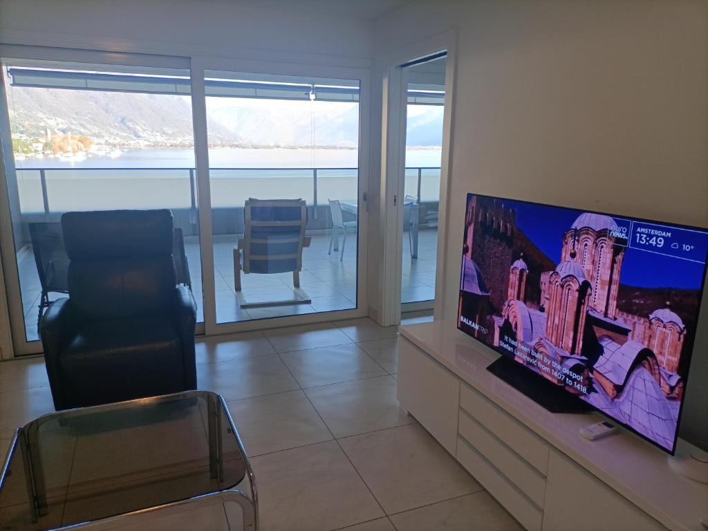 TV i/ili multimedijalni sistem u objektu Residenza Vivian Deluxe Apartments