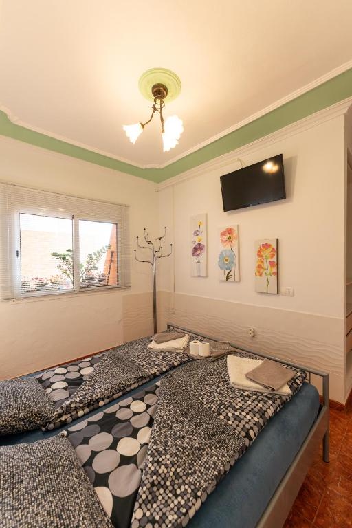 Posteľ alebo postele v izbe v ubytovaní Casa Resi