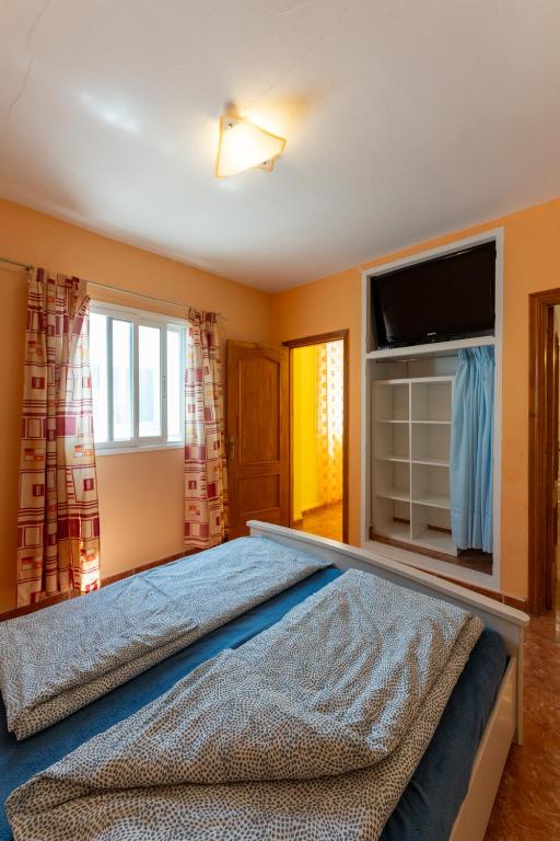 Posteľ alebo postele v izbe v ubytovaní Casa Resi