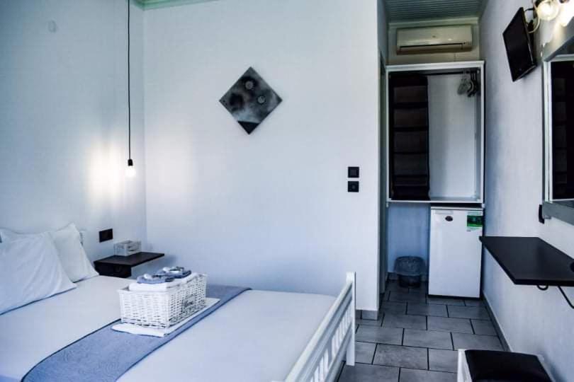 Postel nebo postele na pokoji v ubytování Kinira Beach Hotel