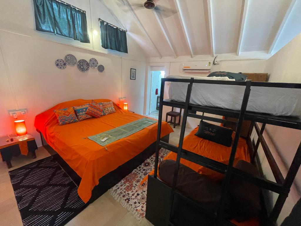 Postel nebo postele na pokoji v ubytování Art Resort Goa