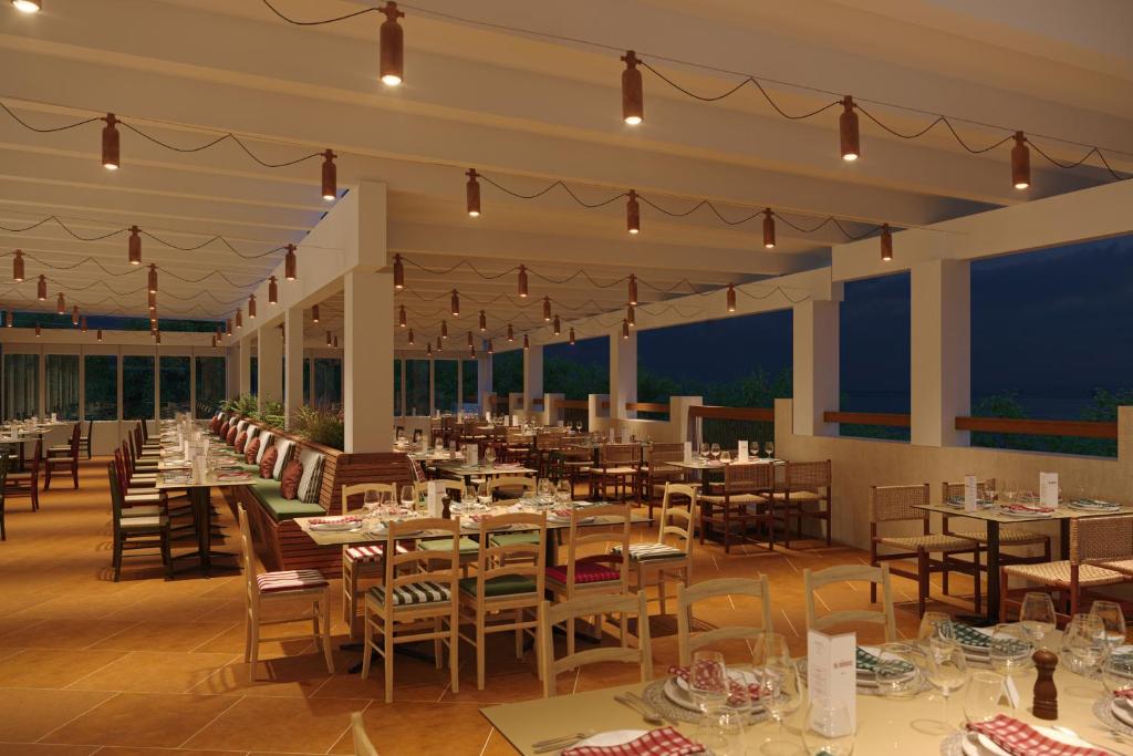 Restaurace v ubytování Mangia's Sardinia Resort - NEW OPENING