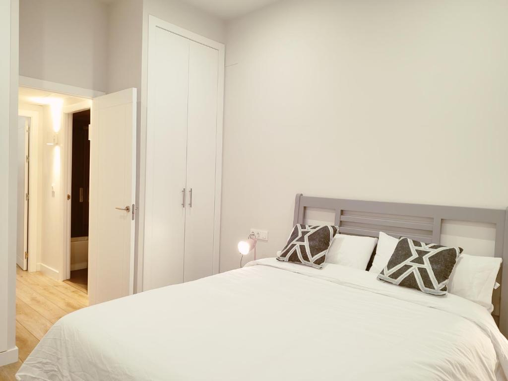 A bed or beds in a room at Ribera de Cordoba