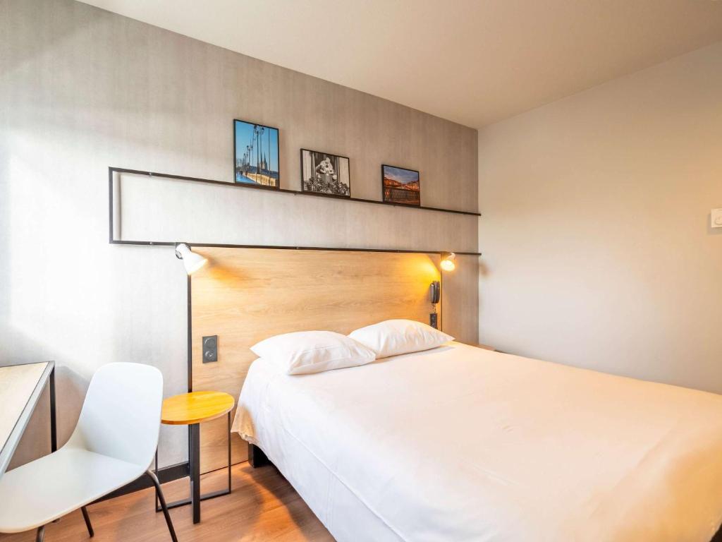 Postel nebo postele na pokoji v ubytování ibis Bayonne Centre