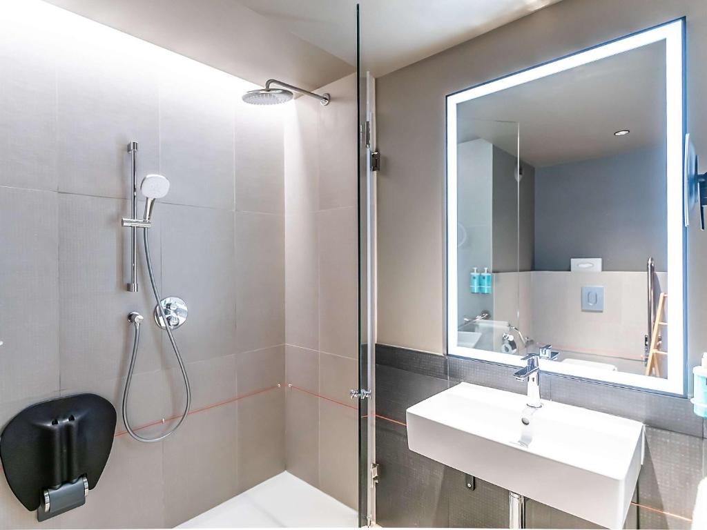 Ванная комната в Novotel Setubal