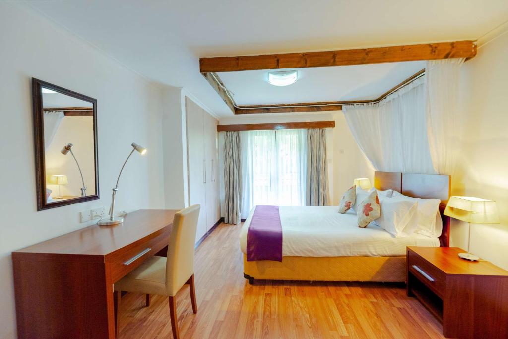 Uma cama ou camas num quarto em Heri Heights Hotel Apartments, SureStay Collection by Best Western