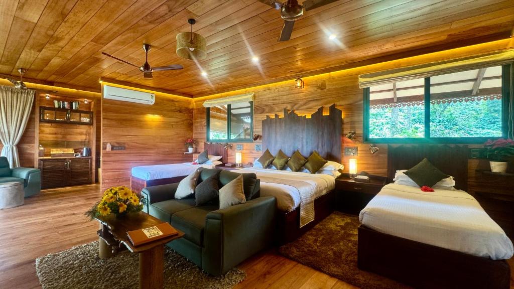 Voodi või voodid majutusasutuse Tranquil Resort - Blusalzz Collection, Wayanad - Kerala toas