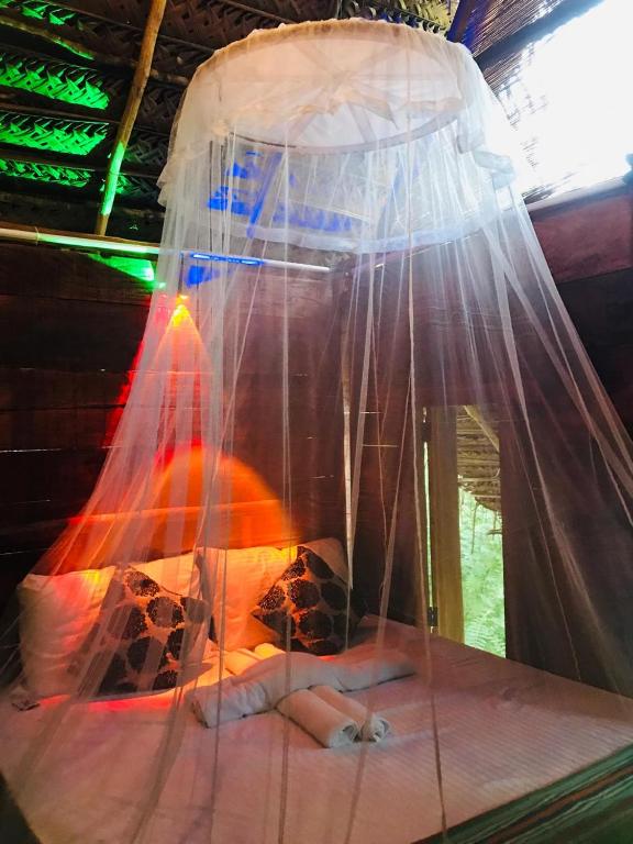 Postel nebo postele na pokoji v ubytování Atha Tree House