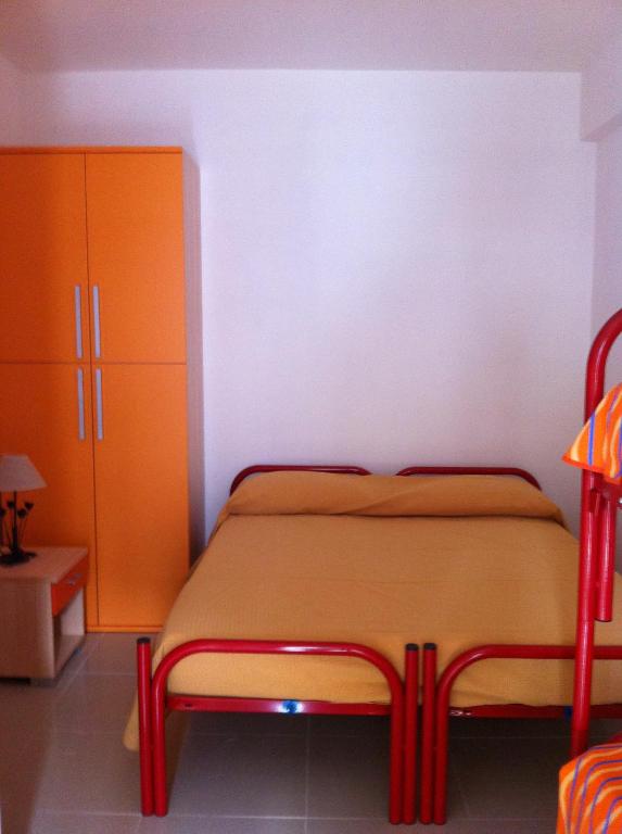 Posteľ alebo postele v izbe v ubytovaní Appartamenti Bramante