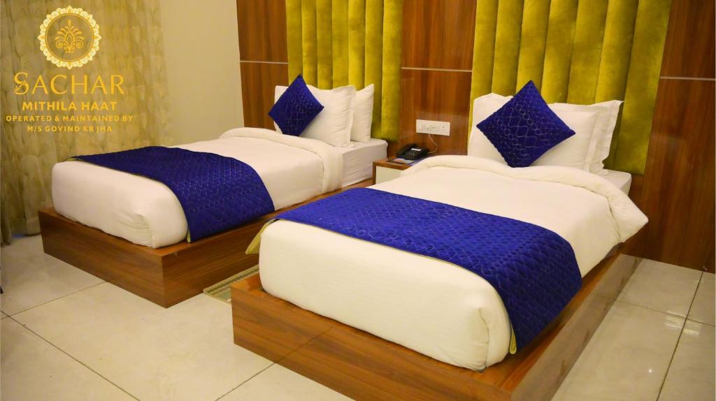 Postel nebo postele na pokoji v ubytování Sachar Resort