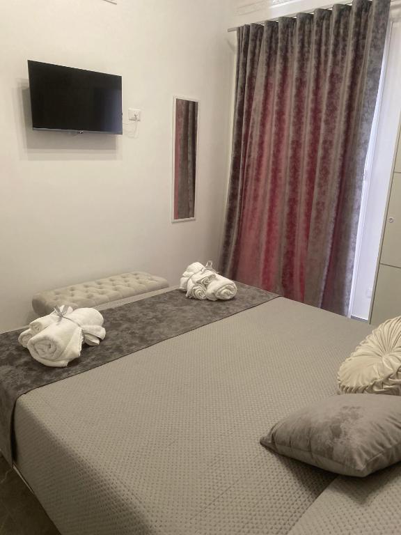 Postel nebo postele na pokoji v ubytování Soevi Appartamenti