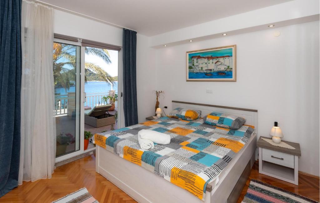 Posteľ alebo postele v izbe v ubytovaní One-Bedroom Apartment In Blace