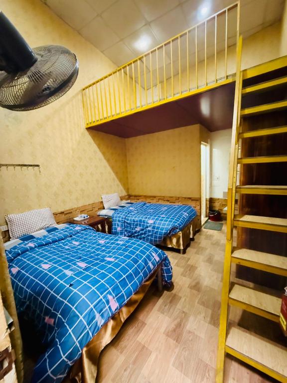 Postel nebo postele na pokoji v ubytování Dang Khoa Homestay