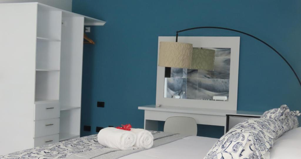 Postel nebo postele na pokoji v ubytování All Seasons Hotel