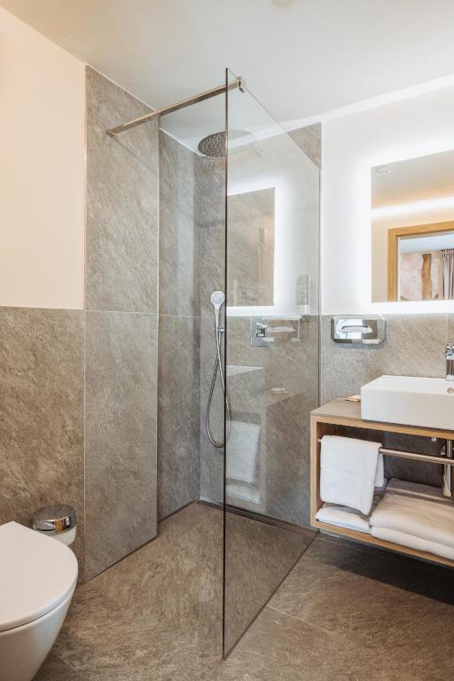 Koupelna v ubytování Residence Piz Aot