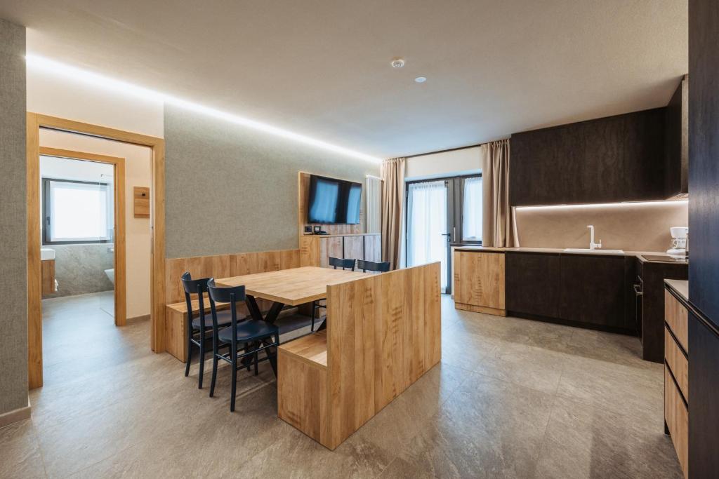 Kuchyň nebo kuchyňský kout v ubytování Residence Piz Aot