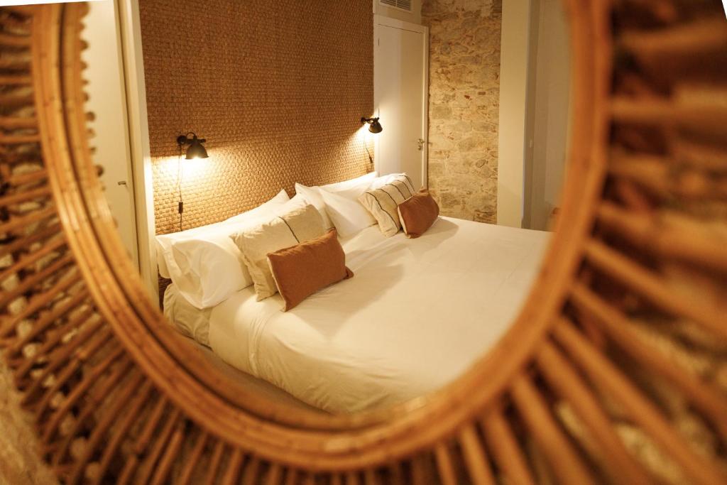 Postel nebo postele na pokoji v ubytování La Comuna by Bon Dia Residences