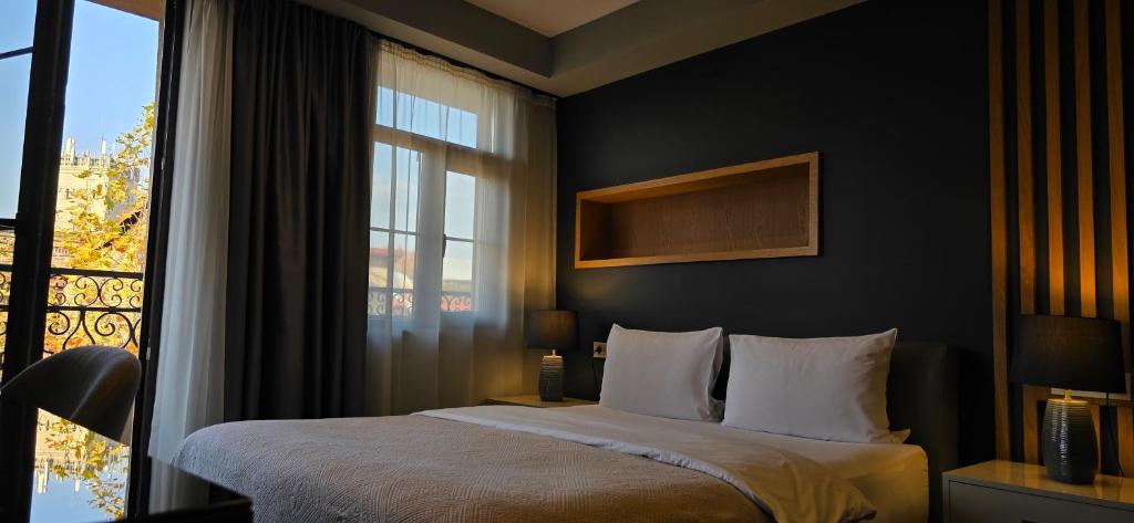 Postel nebo postele na pokoji v ubytování Silver 39 Corner Hotel