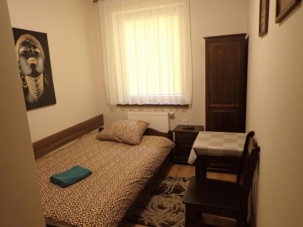Postel nebo postele na pokoji v ubytování Noclegi Kochlice