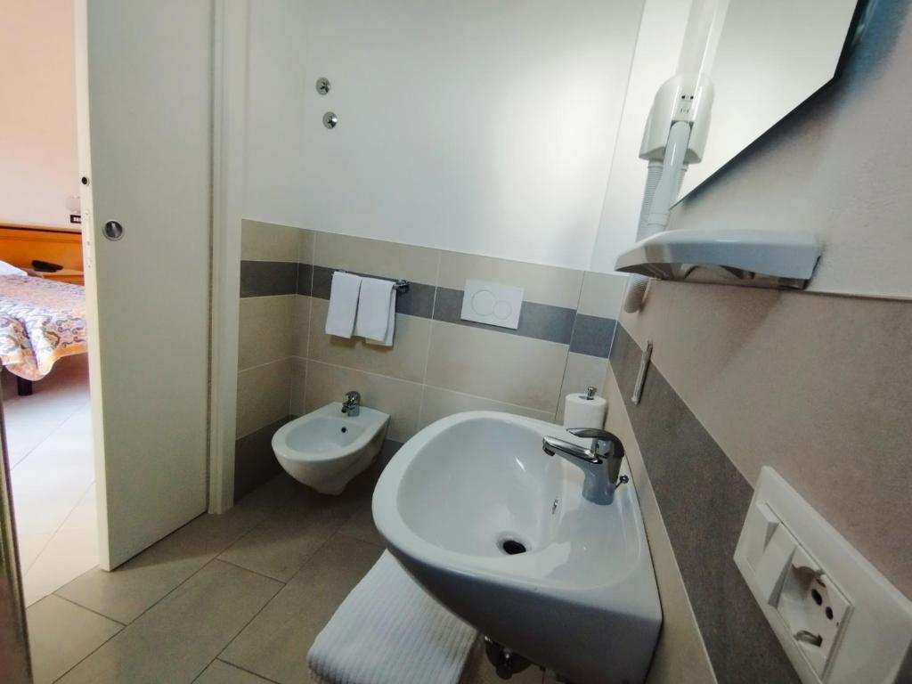 Kúpeľňa v ubytovaní Hotel Excelsior
