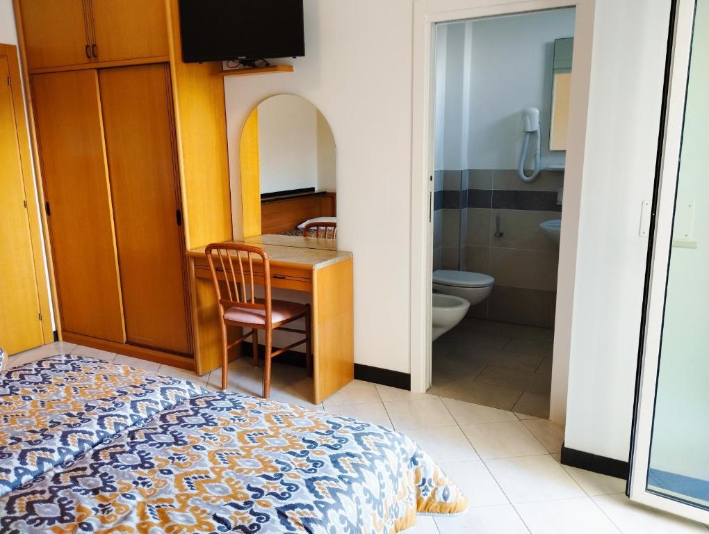 Posteľ alebo postele v izbe v ubytovaní Hotel Excelsior