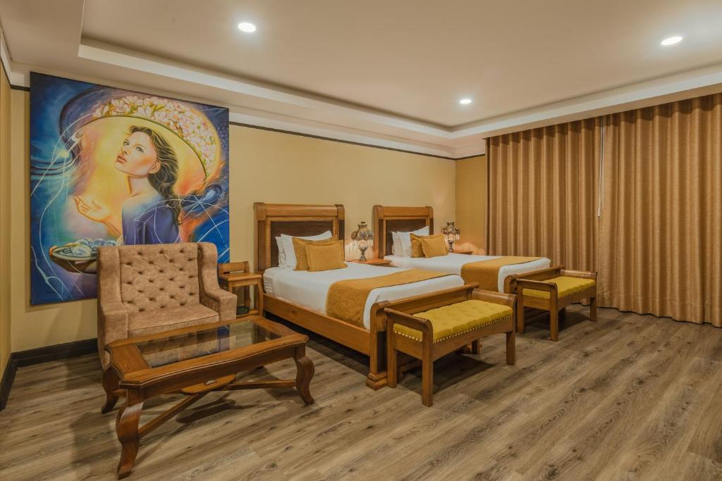 Postel nebo postele na pokoji v ubytování Hotel Du Parc