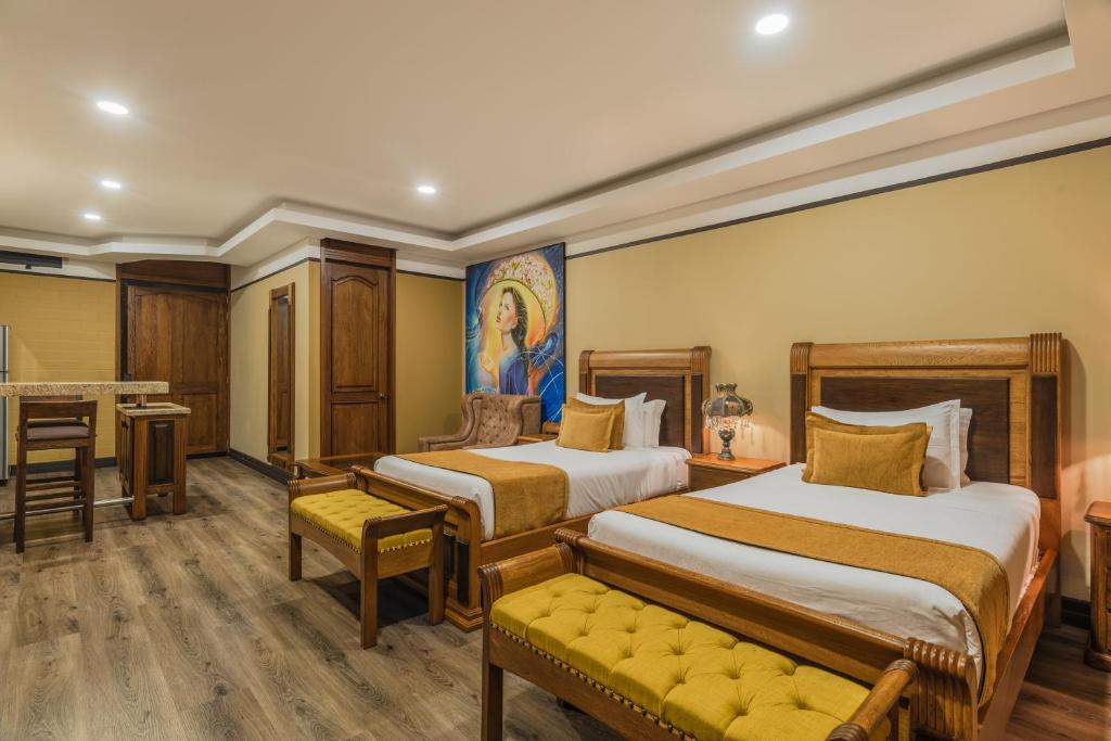 Postel nebo postele na pokoji v ubytování Hotel Du Parc