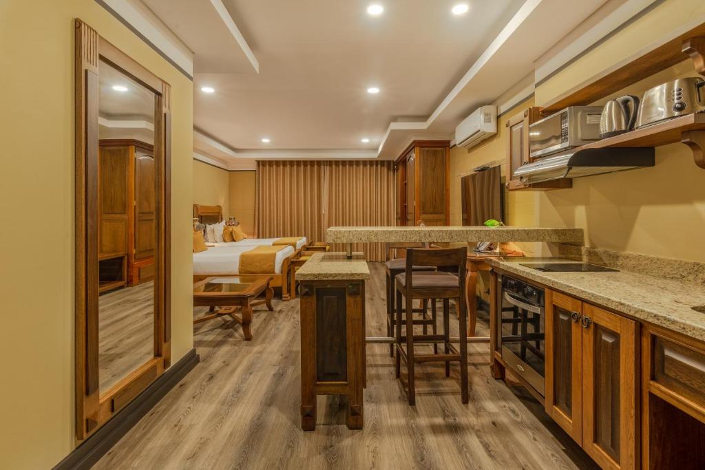 Kuchyň nebo kuchyňský kout v ubytování Hotel Du Parc