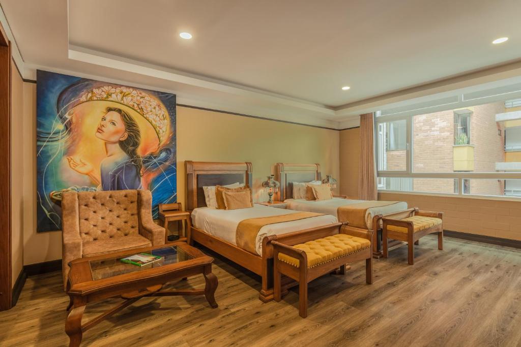 Postel nebo postele na pokoji v ubytování Hotel Du Parc