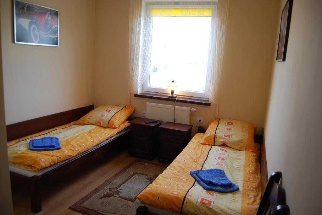 Postel nebo postele na pokoji v ubytování Noclegi Kochlice