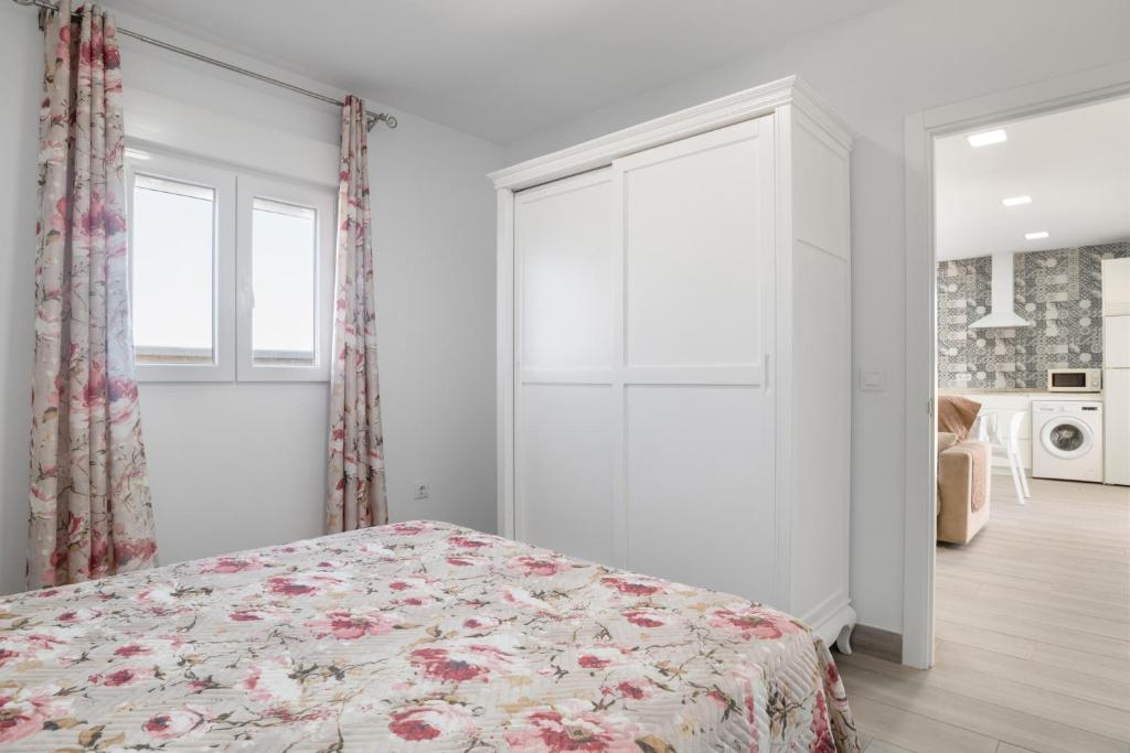 Postel nebo postele na pokoji v ubytování Villa de Gomar