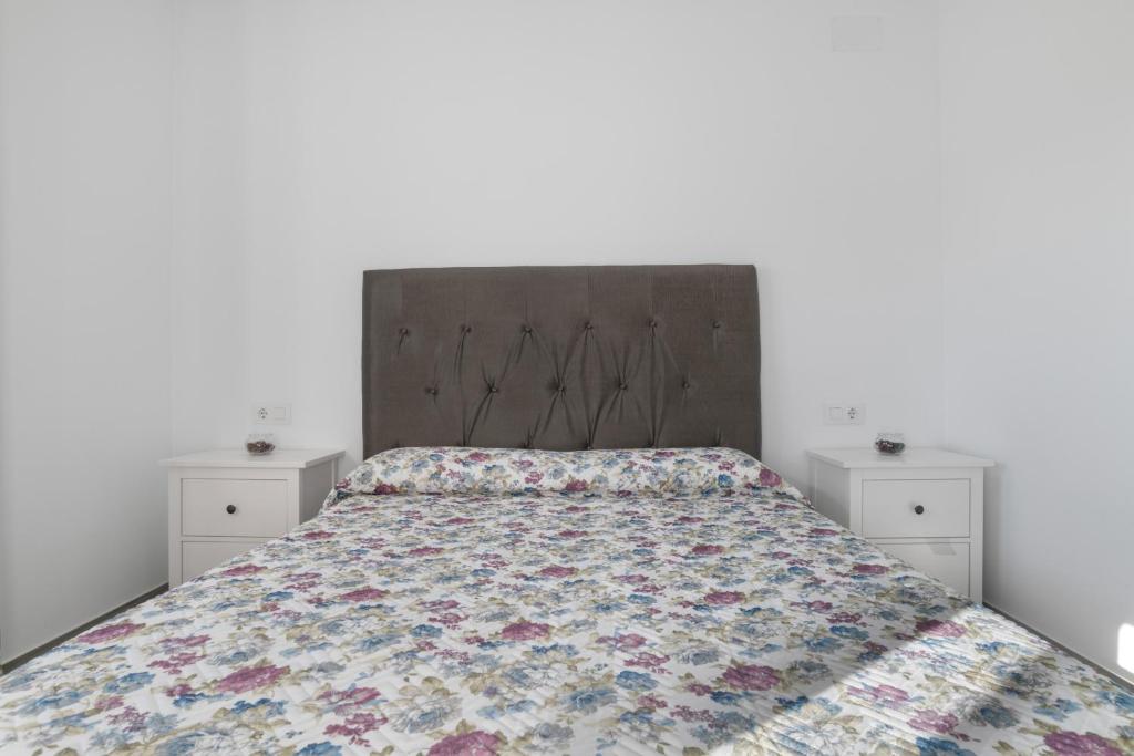 Postel nebo postele na pokoji v ubytování Villa de Gomar