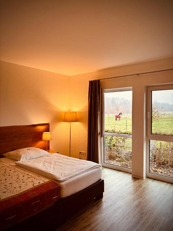 Postel nebo postele na pokoji v ubytování Hotel Rappenhof
