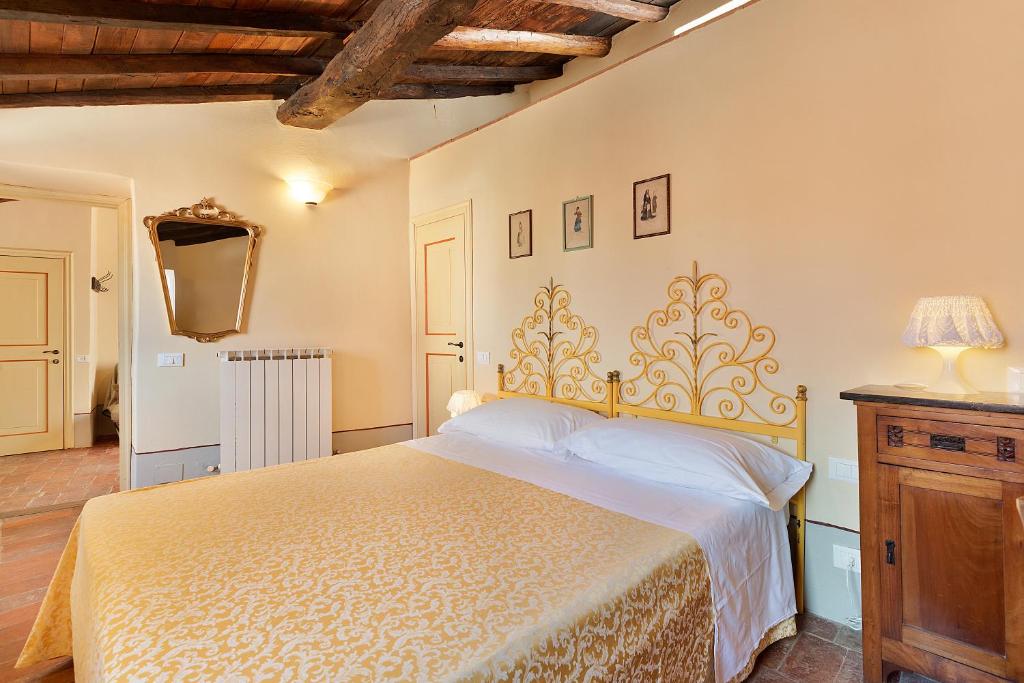 Postel nebo postele na pokoji v ubytování Corte Paganini Casa Vacanze