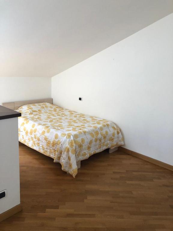 Postel nebo postele na pokoji v ubytování Appartamento confortevole