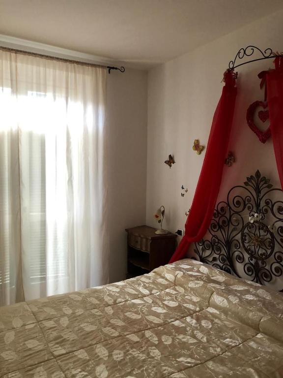 Postel nebo postele na pokoji v ubytování Appartamento confortevole