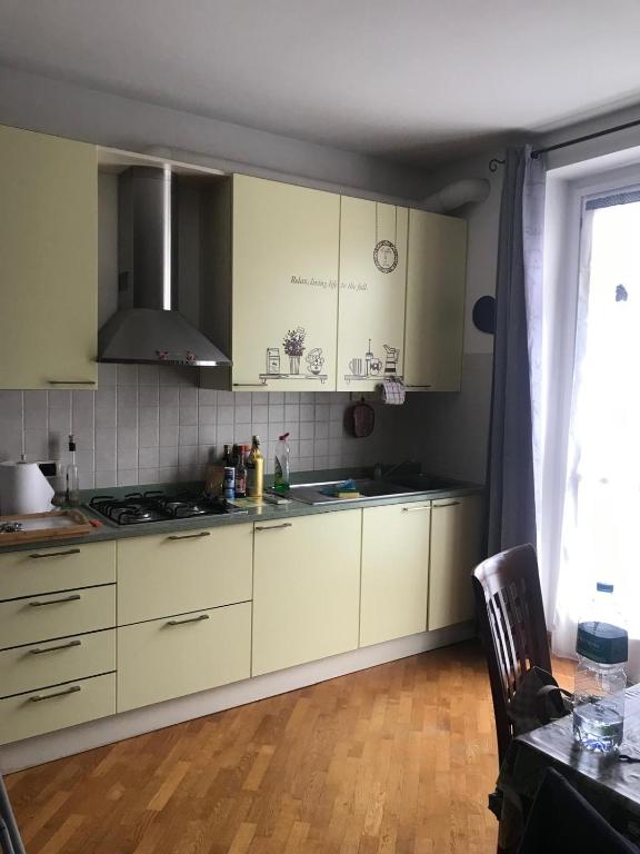 Kuchyň nebo kuchyňský kout v ubytování Appartamento confortevole