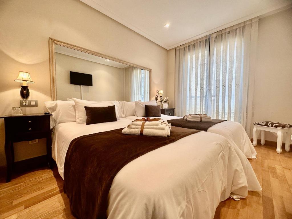 Postel nebo postele na pokoji v ubytování Clarens Guesthouse