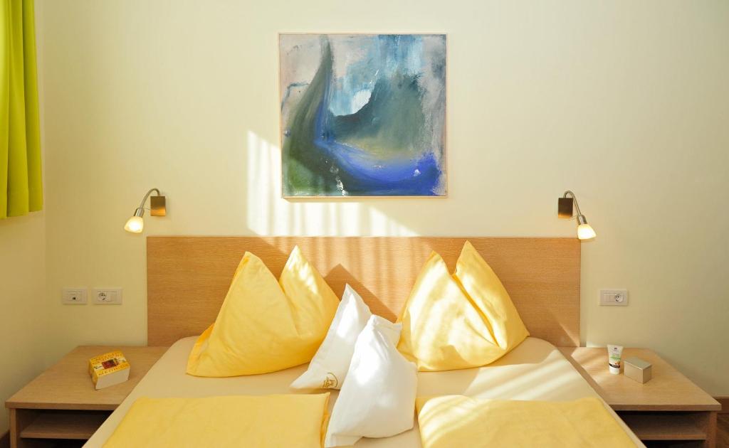 Postel nebo postele na pokoji v ubytování Residence Mignon