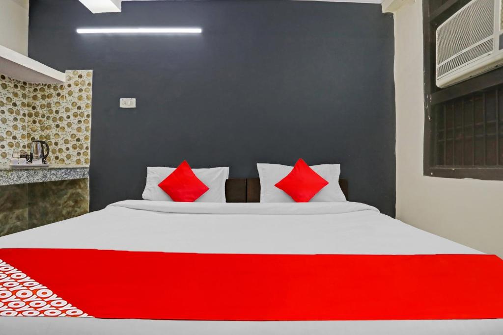 Postel nebo postele na pokoji v ubytování Hotel O Dremland Residency