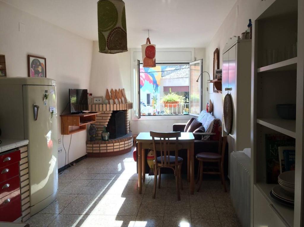 TV a/nebo společenská místnost v ubytování Casa taller Penelles